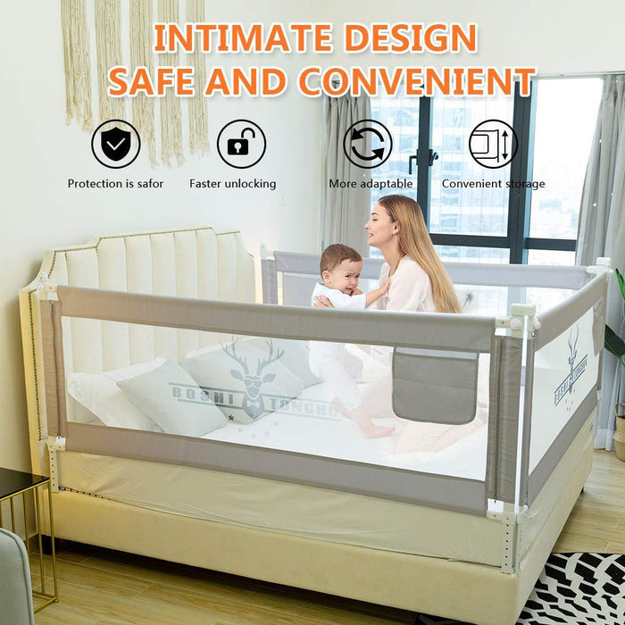 A Baby and Mother is Playing Inside a Bed Protected with Baby Bed Rail.