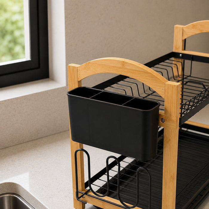 2 Tier Kitchen Dish Drying Rack with a black plastic cup holder, shown in a kitchen setting next to a sink and window.