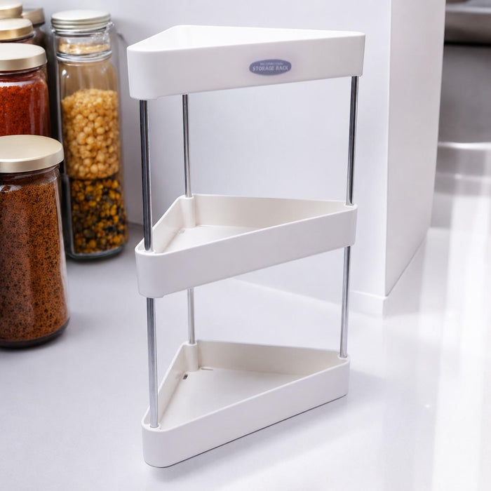 Corner kitchen storage rack with jars of spices on a white countertop