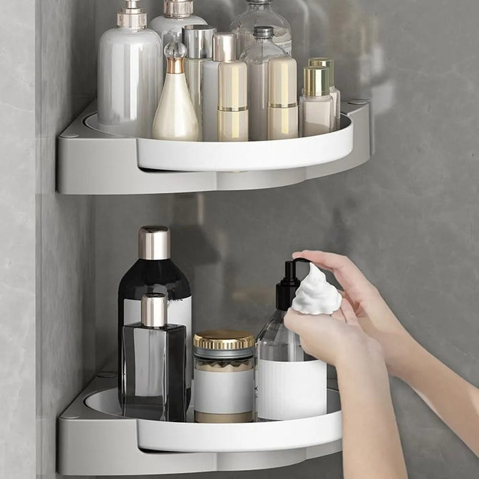 Someone using shampoo from the 360° Rotatable Washroom and Kitchen Corner Rack