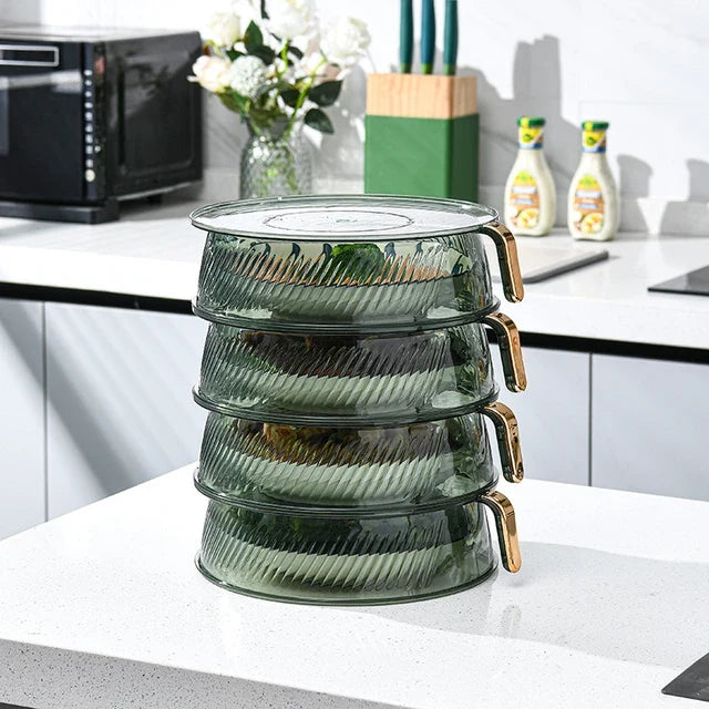 Four plastic food storage containers with handles, stackable for easy storage. Ideal for keeping fruits and vegetables fresh