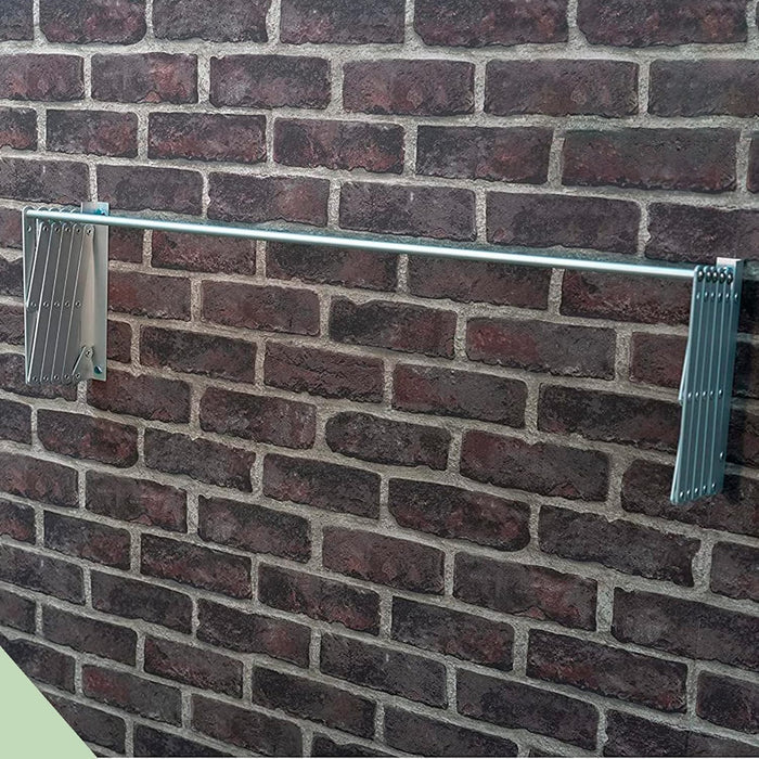 Wall-mounted extendable clothes hanger on the wall