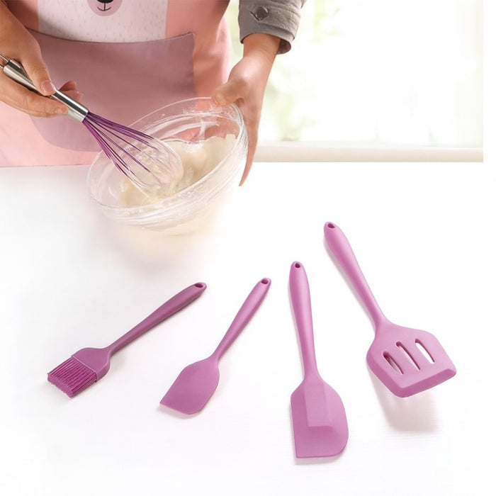 A Person is Baking Cake Batter Using 5-Piece Silicone Baking Utensil Set.
