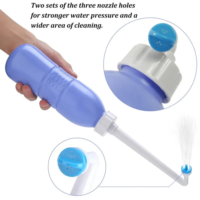 A hand holding  and its nozzle hols closep image
