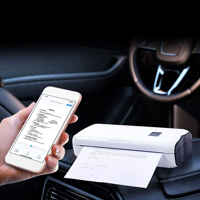 Hand holding a smartphone with a printing app next to a A4 Portable Thermal Printer on a car dashboard.