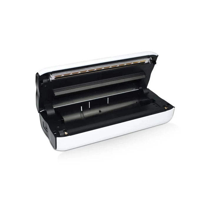 A white and black vacuum sealer shown open against a plain white background.