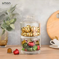 An Acrylic Chocolate Container with Chocolates.