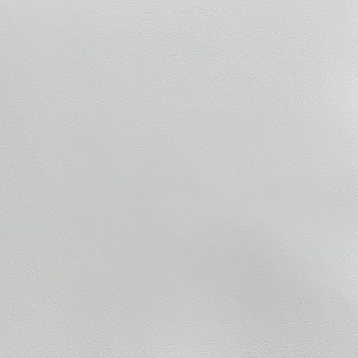 A close-up of an alabaster white textured adhesive vinyl.
