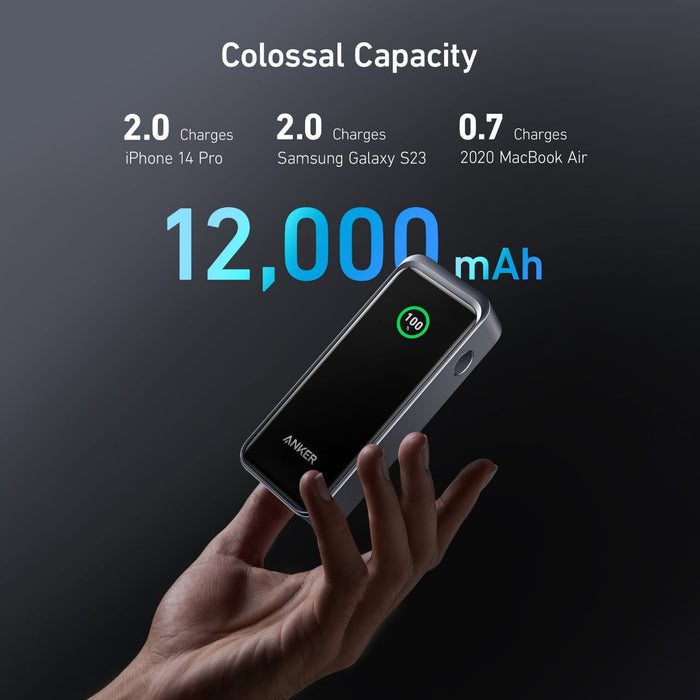 A Person is Holding Anker Prime 12,000 mAh Power Bank (130 W) -A1335011.