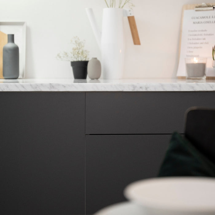 A kitchenette vinyl wrapped with anthracite matte adhesive vinyl.