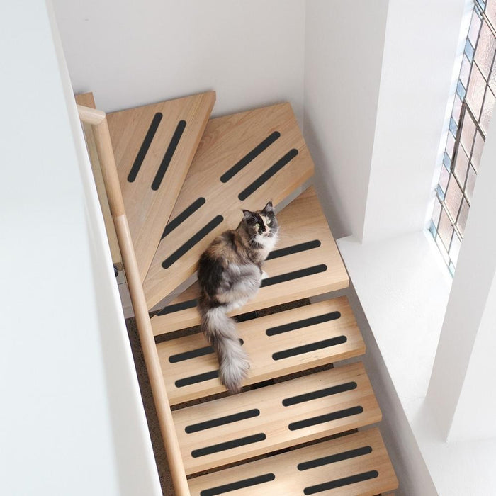 Black anti-slip grip strips in stairs