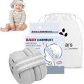 A Baby is Wearing Baby Ear Muffs and Package is Placed Nearby.