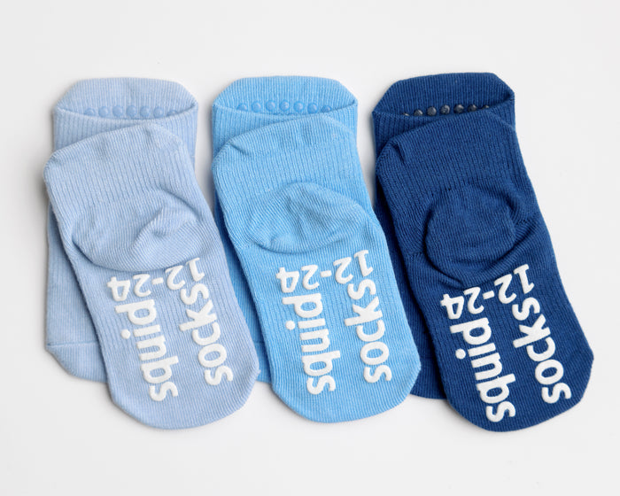 Chaney ankle socks: three blue ankle socks showing branded sole grips. Squid Socks, the brand seen on Shark Tank.