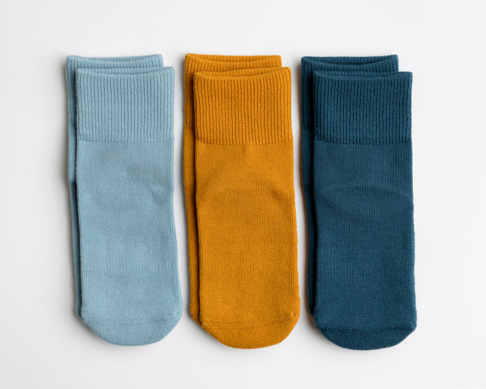 Camden cotton crew socks: three cotton crew socks in pale blue, mustard and dark teal. Squid Socks, the brand seen on Shark Tank.