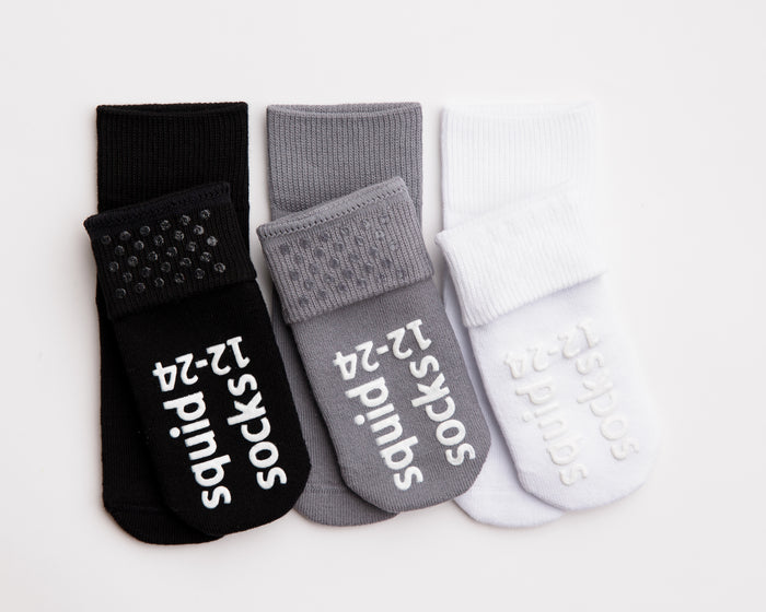 Casey cotton crew socks: black, gray and white crew socks showing sole grips. Squid Socks, the brand seen on Shark Tank.