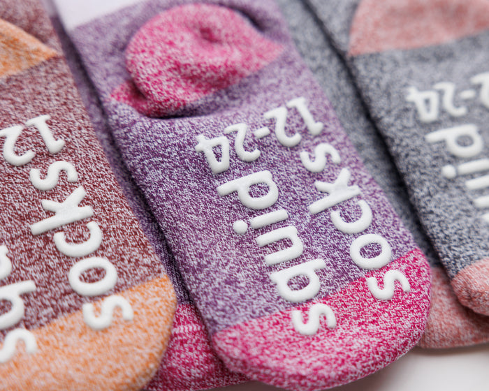 Chelsea cotton crew socks: close-up of contrasting heels and sole grips. Squid Socks, the brand seen on Shark Tank.