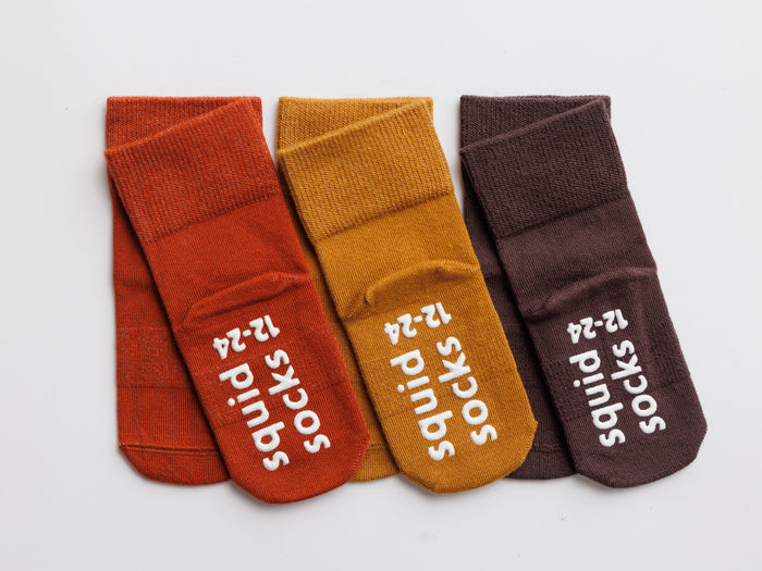 Cedar kids socks: three warm-toned socks with branded sole grips. Squid Socks, the brand seen on Shark Tank.