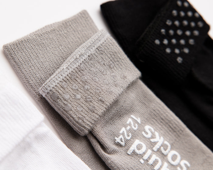 Charlie kids socks: close-up of gray cuff dots and sole grips. Squid Socks, the brand seen on Shark Tank.
