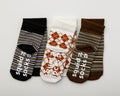 Chesney kids socks: striped and argyle socks showing branded sole grips. Squid Socks, the brand seen on Shark Tank.