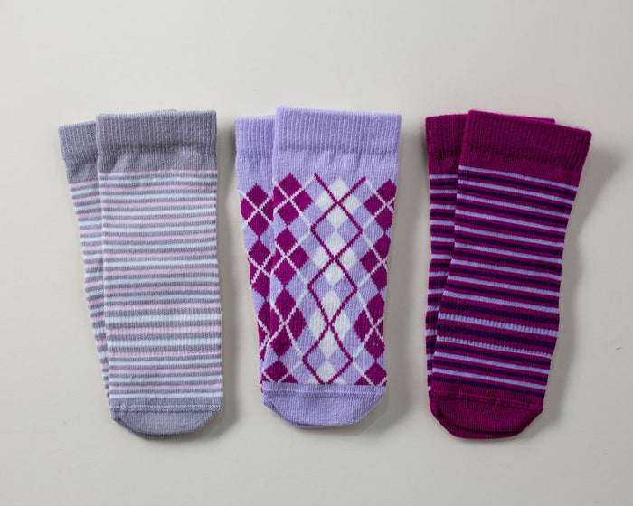 Christina kids socks: three gray, lavender and magenta striped and argyle socks. Squid Socks, the brand seen on Shark Tank.
