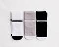City kids socks: three striped-cuff socks in white, gray and black. Squid Socks, the brand seen on Shark Tank.