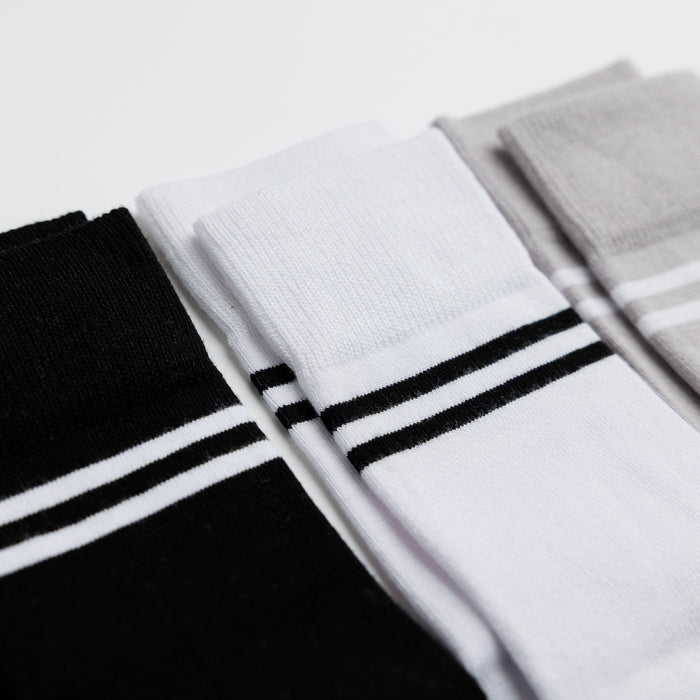 City kids socks: close-up of contrasting stripes around neutral cuffs. Squid Socks, the brand seen on Shark Tank.