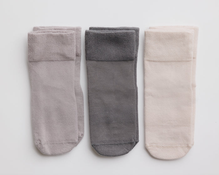 Classic kids socks: three solid socks in light gray, dark gray and sand. Squid Socks, the brand seen on Shark Tank.
