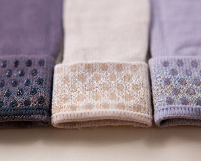 Classic kids socks: close-up of silicone dots on folded neutral cuffs. Squid Socks, the brand seen on Shark Tank.