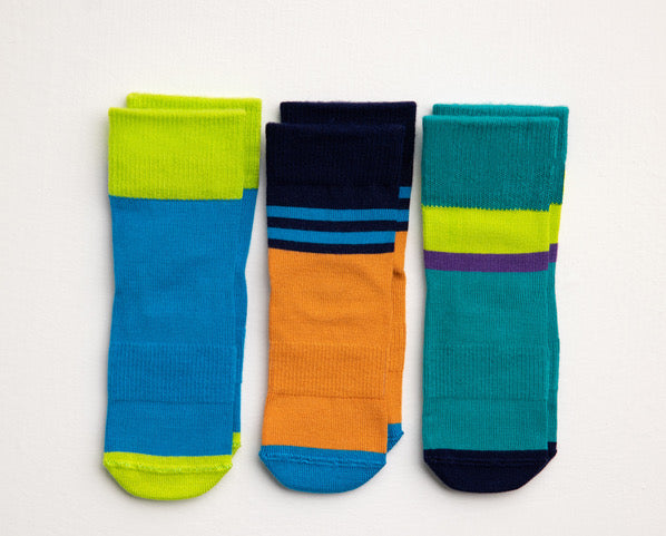 Clint kids socks: three color-block socks in blue, orange and teal. Squid Socks, the brand seen on Shark Tank.