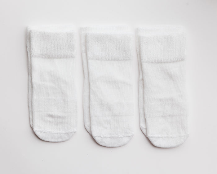 Cloud kids socks: three white socks laid flat. Squid Socks, the brand seen on Shark Tank.