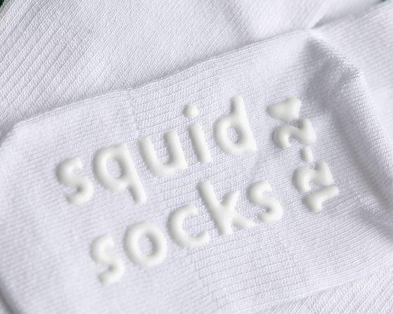 Cloud kids socks: close-up of white branded sole grips. Squid Socks, the brand seen on Shark Tank.