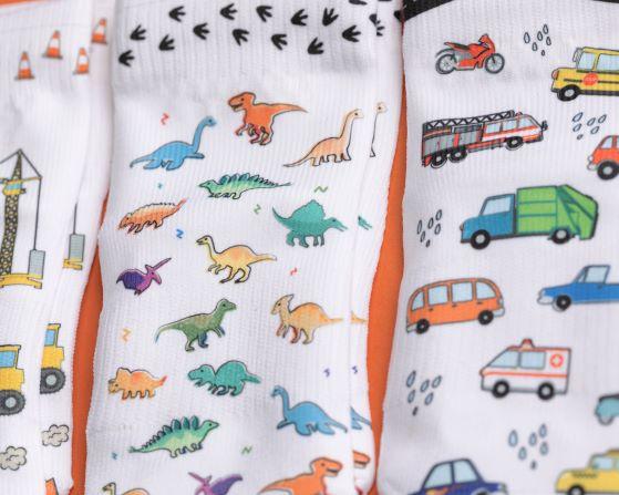 Cohen kids socks: close-up of dinosaur and vehicle designs. Squid Socks, the brand seen on Shark Tank.