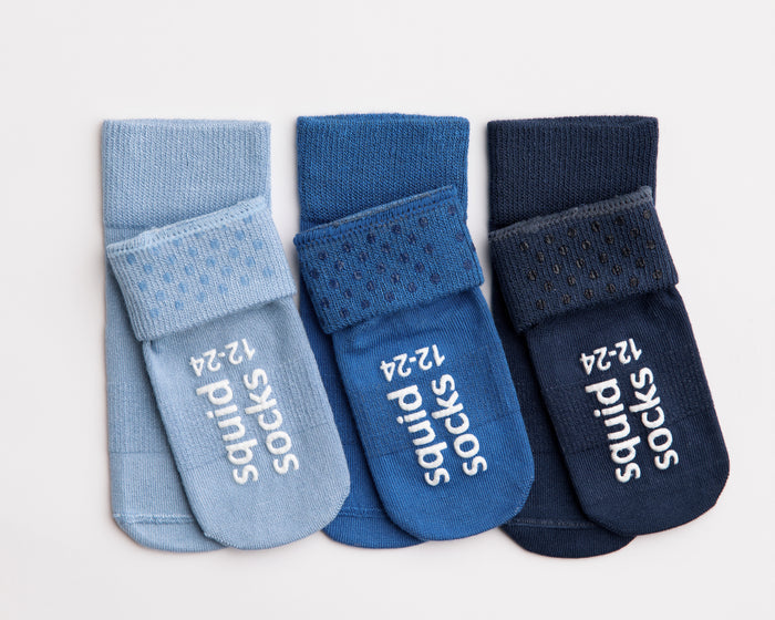 Colby kids socks: three blue socks showing cuff and sole grips. Squid Socks, the brand seen on Shark Tank.