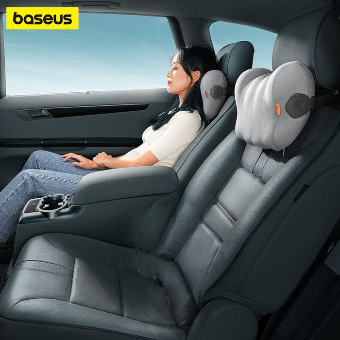 A Woman is Resting in a Car Using Baseus ComfortRide Car Headrest Neck Pillow.