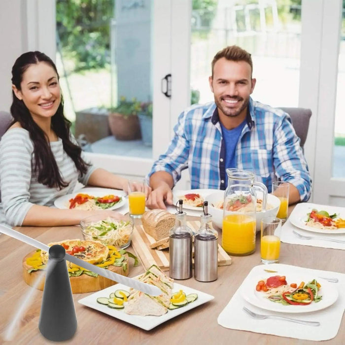 family enjoying their meal with  Fan Fly Repellent on top of their table