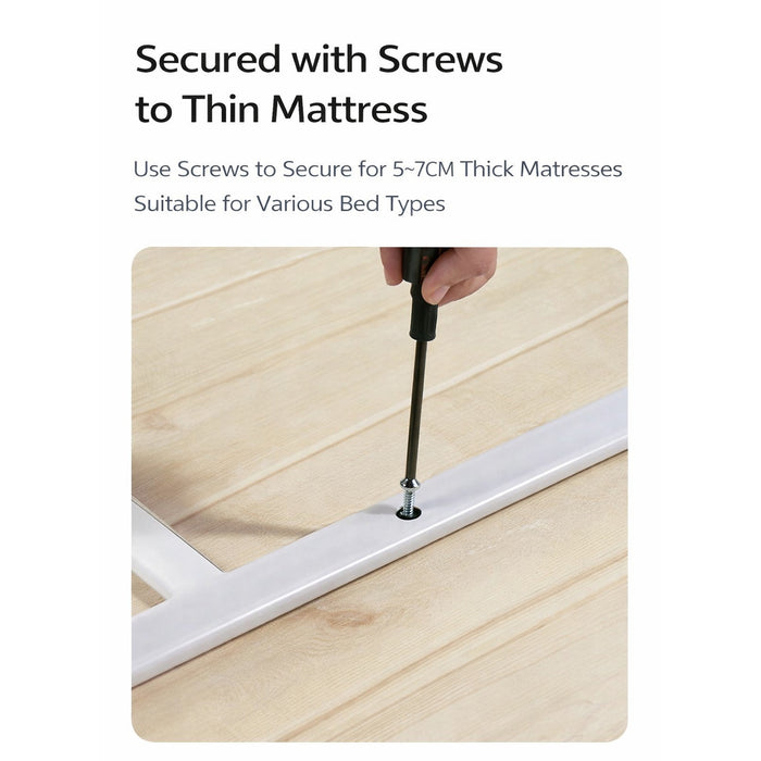 A Person is Securing Bed Assist Rail with Safety Handle with Screws.
