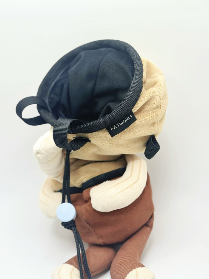 Dazed mocha brown and pink fish design on a cute plush chalk bag for rock climbing. Shows wide shocked eyes,  and a functional stiffened rim. A unique climbing gift for climbers.
