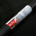 A d-c-fix black glossy adhesive vinyl rolls on a black glossy background.