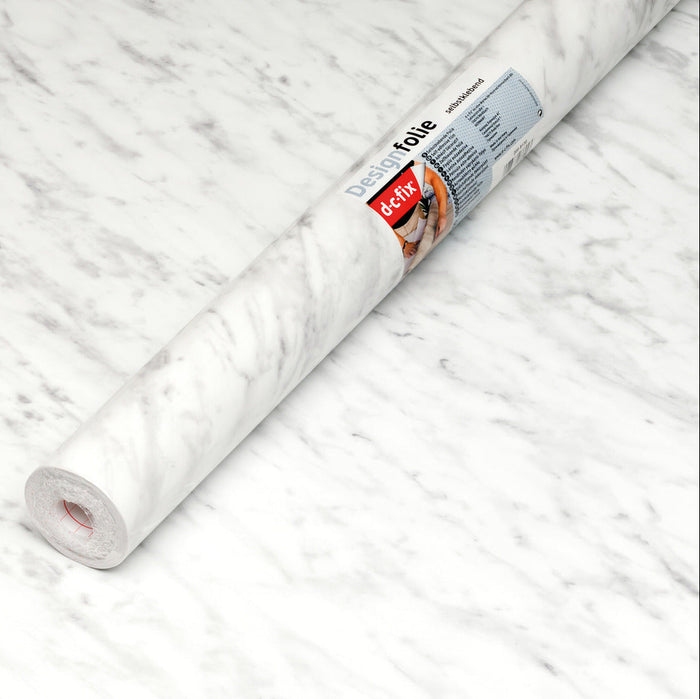Roll of marble vinyl with a brand label on a marble surface