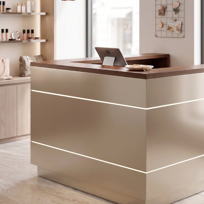 Champagne Nickel Metallic vinyl wrapped reception desk with wooden top in a modern office setting