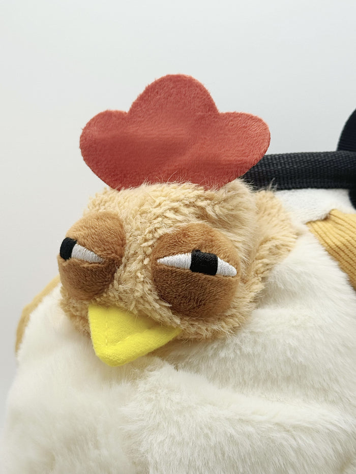 Chaotic chicken chalk bag with funny eyes, plush design, and handle – cute climbing gear for bouldering or gym use