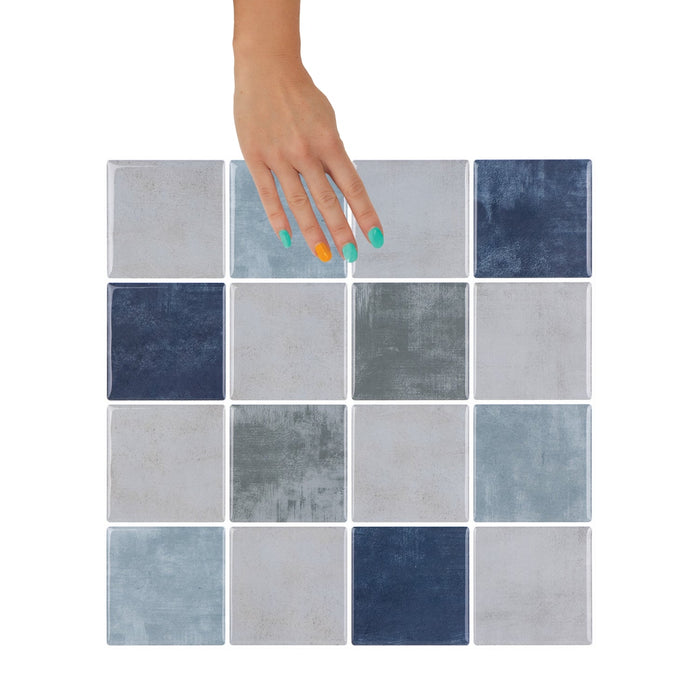 Blue, greige and green checkered tiles with white grout