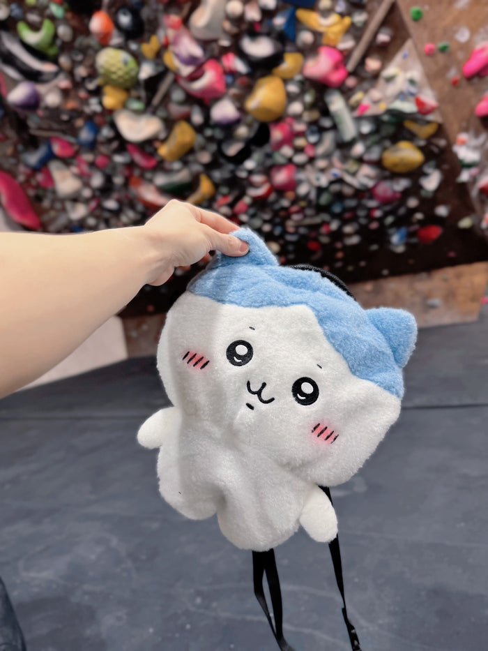 Three cute, fluffy handmade plush climbing chalk bags featuring Chiikawa, Usagi with a chaotic expression, and Hachiware. Designed with high functionality for climbers with wide top rim openings for easy chalk access and fleece-lined interiors. Perfect bouldering accessories and great climbing gifts.
