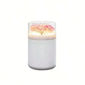 Colorful Flame Humidifier with a floral design on top against a white background