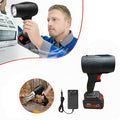 A Person is Using Cordless Air Duster to Ease his Works.
