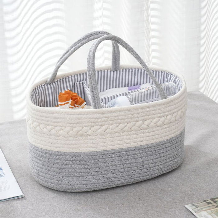 Grey color Nursery Storage Basket  kept on top of a table