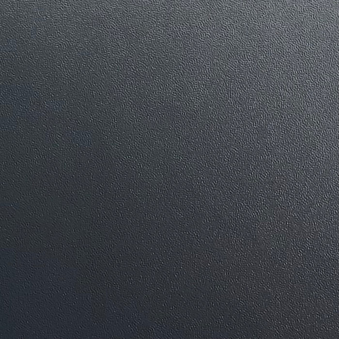 A close-up texture shot of a deep charcoal grey patterned adhesive vinyl.