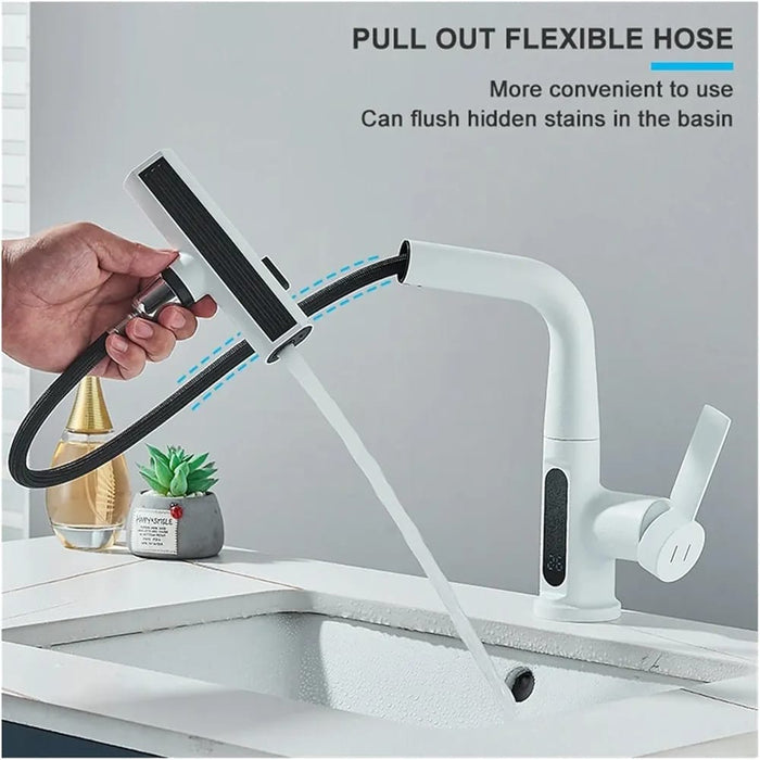 A Person is Holding Digital Display Pull Type Kitchen Faucet.