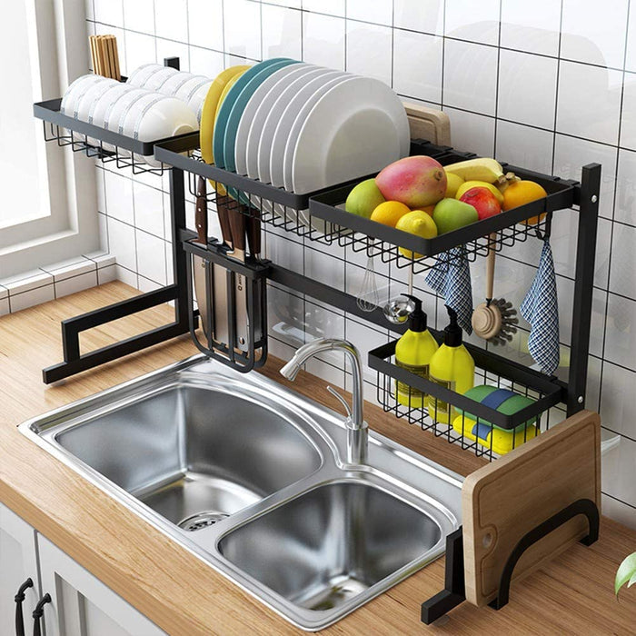 A dish rack with plates and dishes on it