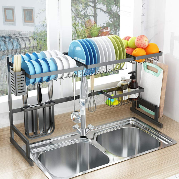 A dish rack with plates and dishes on it